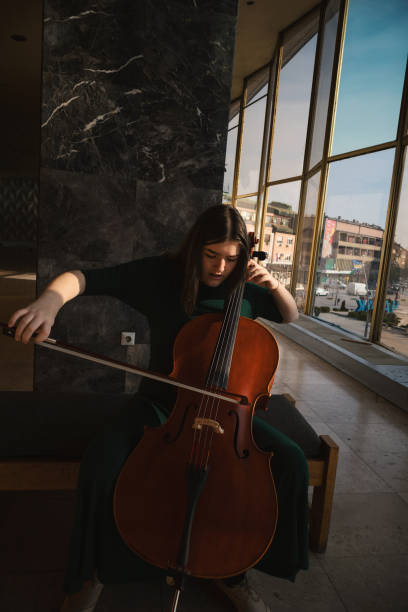 istock Girl with Cello 1290825246