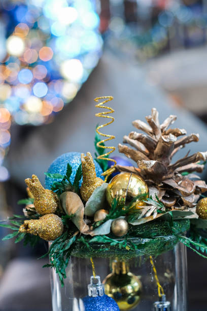 istock Christmas seasons. Christmas decorations. Beautiful decorated tree with presents gift boxes on floor. Close up of ornament on Christmas tree. 1290826447