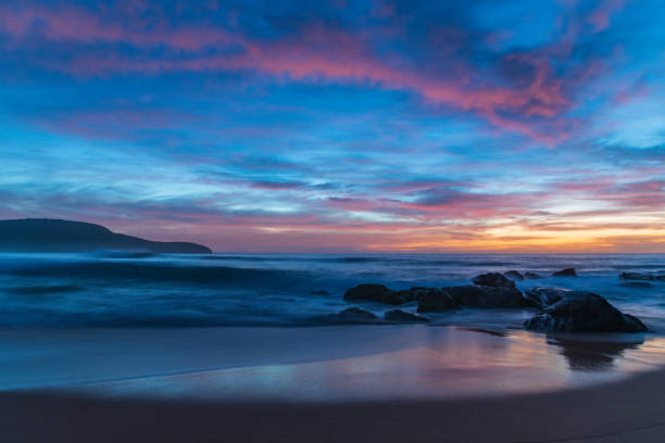 istock High cloud beautiful dawn at the beach 1290829944