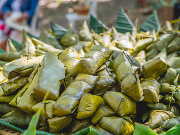 istock Thai boiled dessert wrapped in banana leaves 1290829976