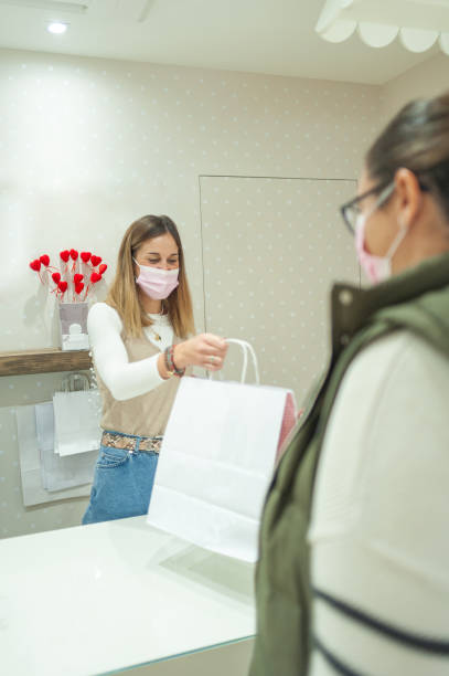 istock Woman shopping. New normal concept 1290831071