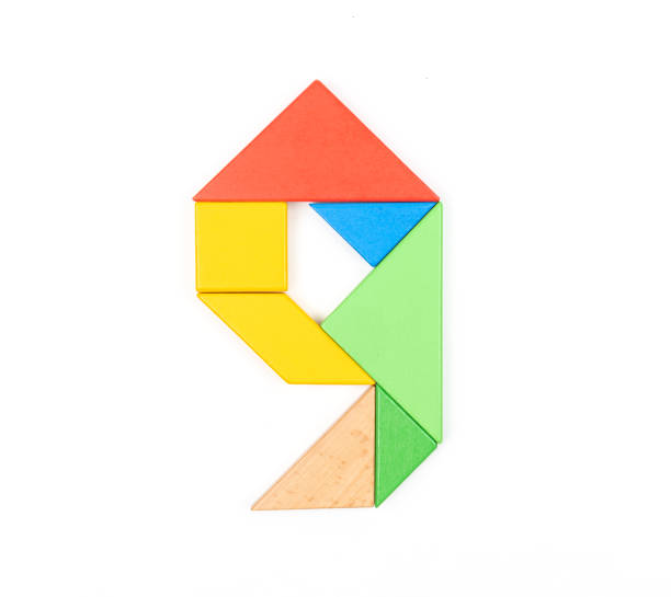 istock Tangram Puzzle Number 9 Symbol 1290831121