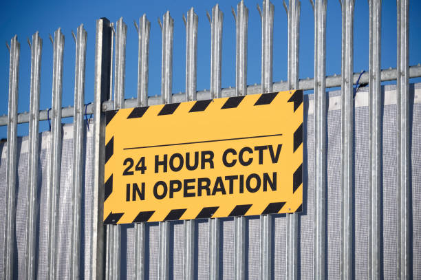 CCTV in operation 24 hours premises protected sign CCTV in operation 24 hours premises protected sign uk surveillance camera sign stock pictures, royalty-free photos & images