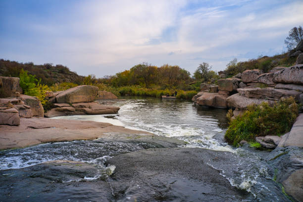 istock Small fast waterfall Kamenka in the evening light in Ukraine 1290832072