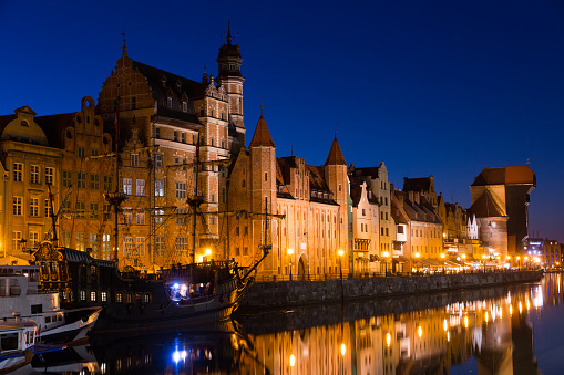 Night view of lighted Motlawa embankment in Polish city of Gdansk