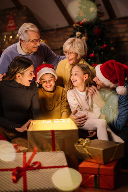 istock They always open gifts as a family 1290839583