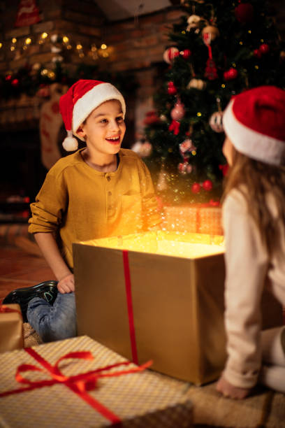 istock Opening their first gift on Christmas morning 1290839595