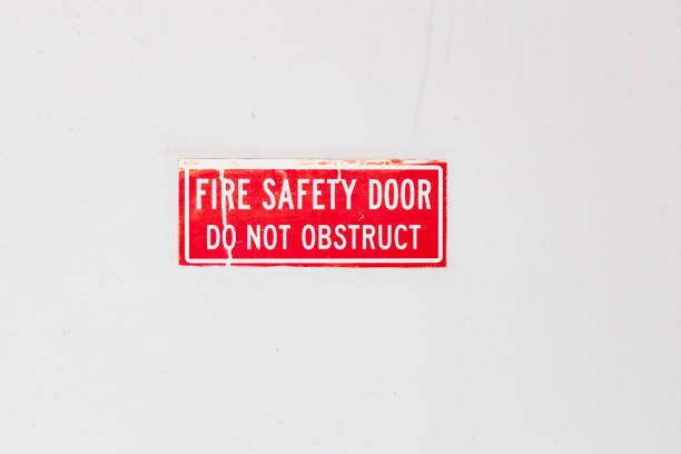 Red sign showing the location of a fire safety door.