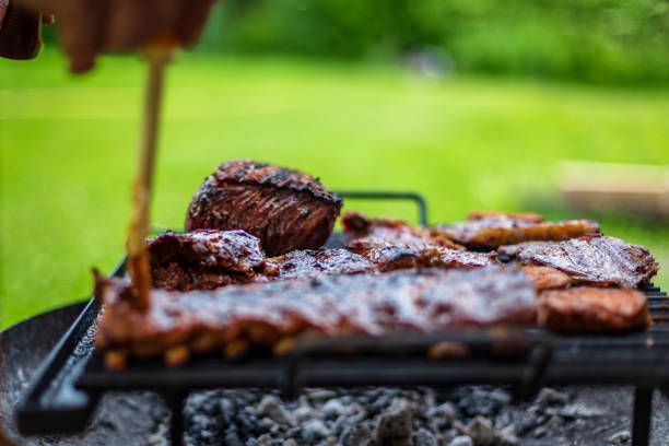 istock barbeque meat preparation in a summer day 1290841701