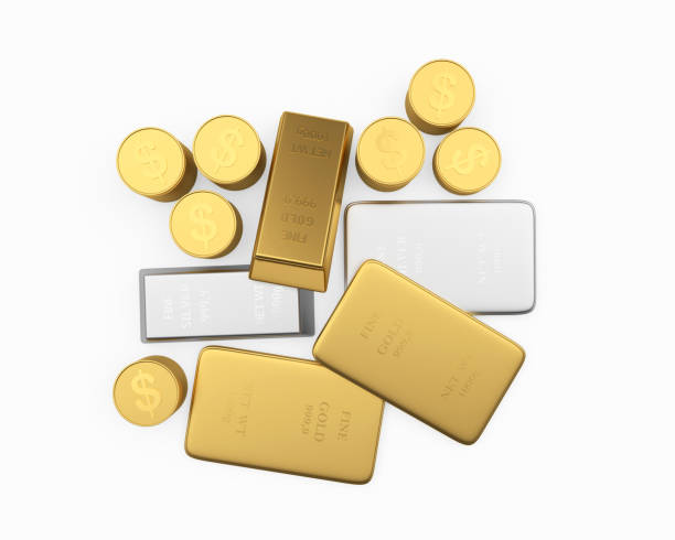 istock Various gold and silver bars and dollar coins top view 1290841997