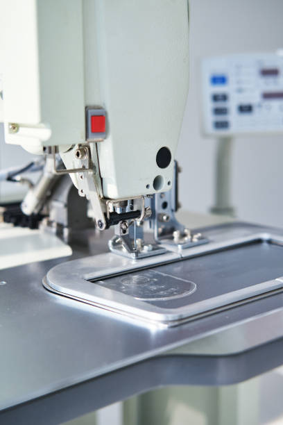 istock Industrial sewing machine repairing 1290843121