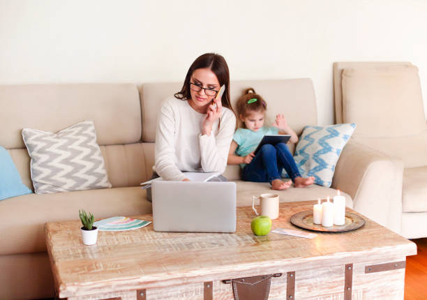 istock Young mother working from home 1290845860