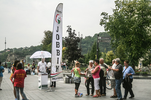Picture of Jobbik banners held by supporters in Budapest, Hungary. Jobbik, the Movement for a Better Hungary commonly known as Jobbik is a Hungarian political party with radical, populist and nationalist roots.