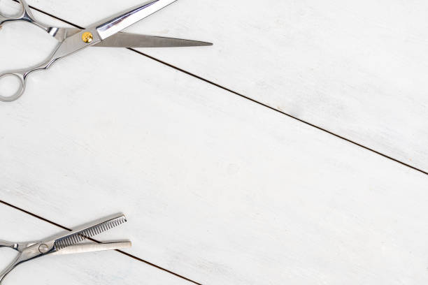 istock Hairdressing tools on a wooden background with copy space 1290850793
