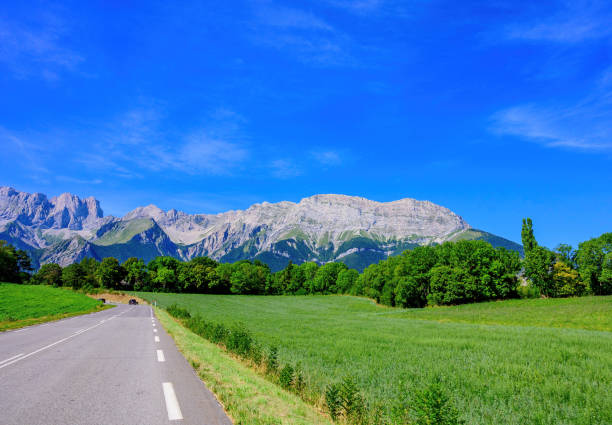 istock Panoramic view on Breche de Faraut mountain range in French Prealps in summer 1290857119