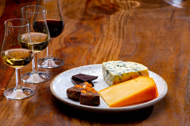 istock Tasting and pairing of different cheeses with strong alcoholic drinks, whisky, cognac or calvados 1290857192