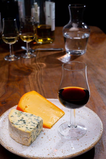 istock Tasting and pairing of different cheeses with strong alcoholic drinks, whisky, cognac or calvados 1290857202