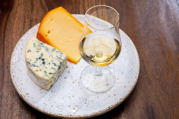 istock Tasting and pairing of different cheeses with strong alcoholic drinks, whisky, cognac or calvados 1290857203