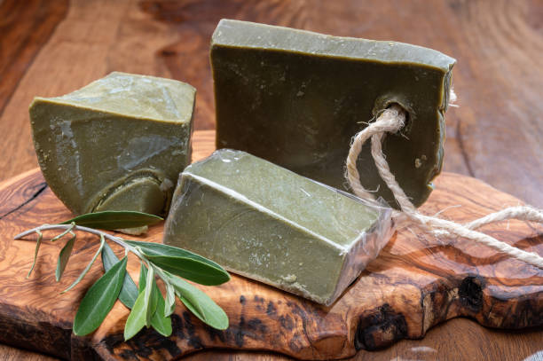 Blocks of handmade bio vegetal natural olives and bay leaf soap Green blocks of handmade bio vegetal natural olives and bay leaf soap from Provence, France savon stock pictures, royalty-free photos & images