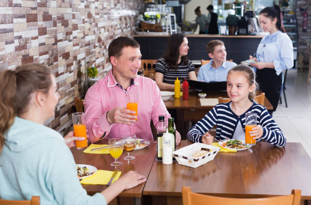istock Family dining and talking 1290857481