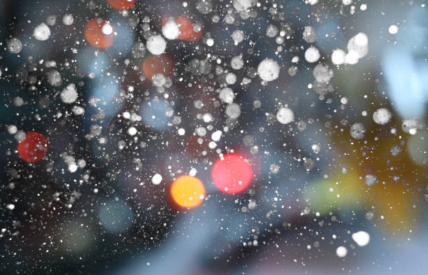 istock background of blurry christmas lights and snow 1290864747