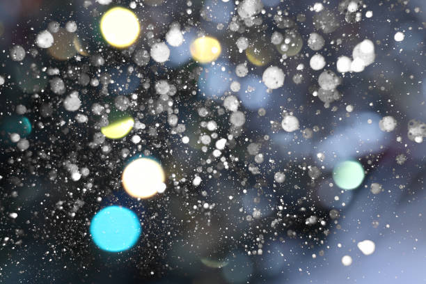 istock background of blurry christmas lights and snow 1290864749
