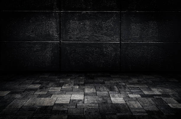 istock Studio dark room concrete floor grunge texture background with lighting effect. 1290868226