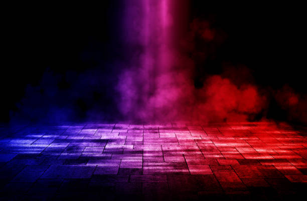 istock Studio dark room fog or mist and lighting effect red and blue on concrete floor grunge texture background. 1290868284
