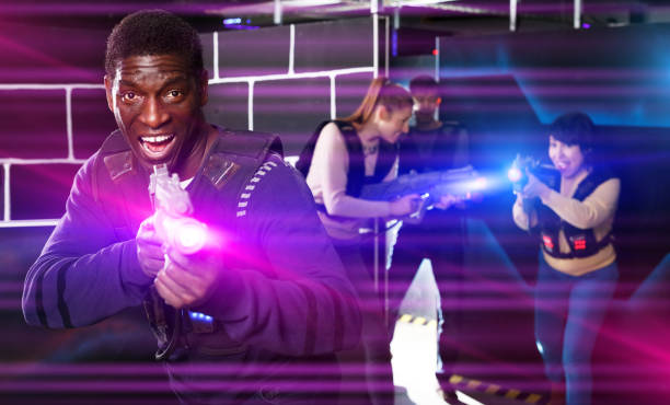 istock African American man playing laser game 1290873062