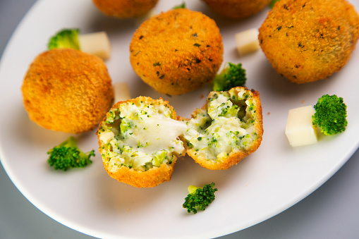 Broccoli croquettes with cheese. Traditional spanish tapa.