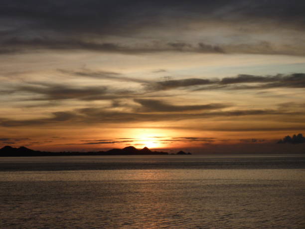 istock Photo of sunset on the beach 1290876818