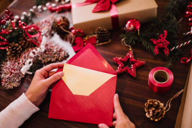 istock Finishing up a Christmas card 1290877652