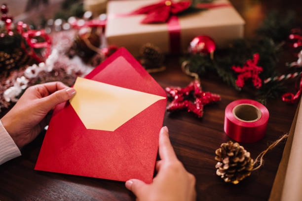 istock Finishing up a Christmas card 1290877684