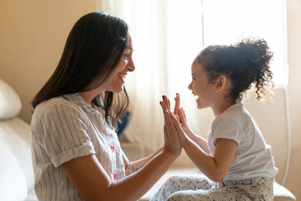 Family bonding Family, Bond, Love, Union, People pics of the godmother stock pictures, royalty-free photos & images