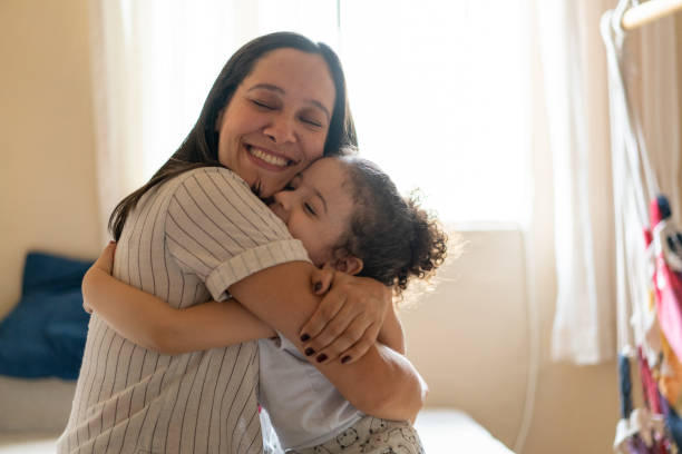 Loving embrace Women, Family, Embracing, Affectionate, Love pics of the godmother stock pictures, royalty-free photos & images