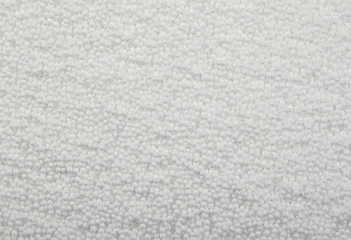 Close up background texture of white expanded polystyrene balls