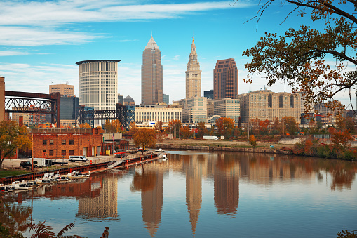 Cleveland, Ohio, USA skyline on the Cuyahoga River in autumn.