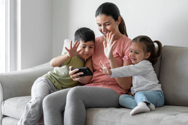 istock Mother having video call with children at home 1290881894
