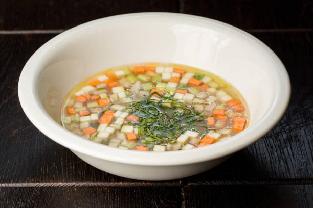 istock vegetable soup with carrots and zucchini garnished with dill 1290882983