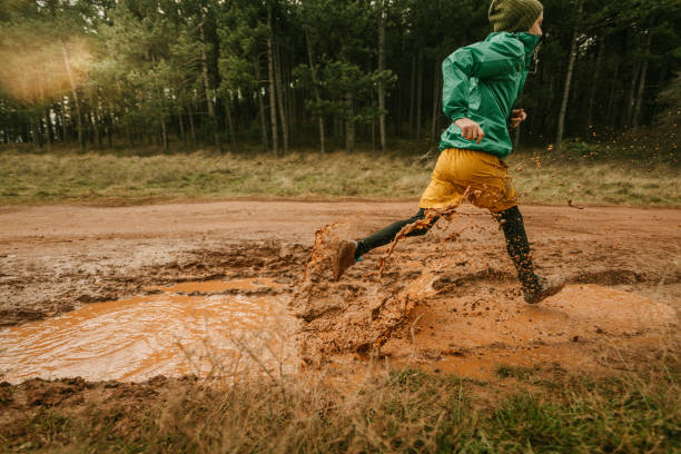 istock Young man exercising on extreme terrain 1290884476