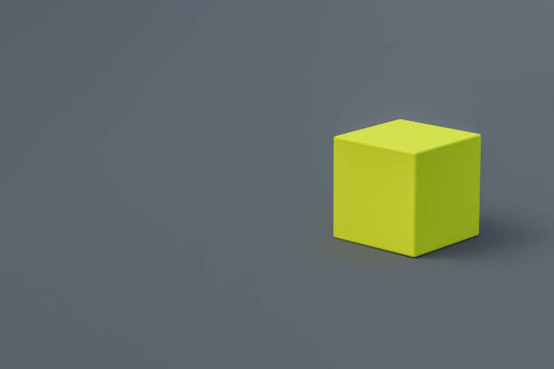 istock Single yellow cube on gray background. Simple geometry shape. Minimalism. Copy space for text. 3d rendering 1290886481