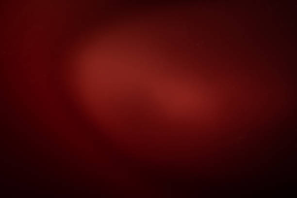 abstract dark red soft background or backdrop. spotlight glow effect. christmas elegant template
