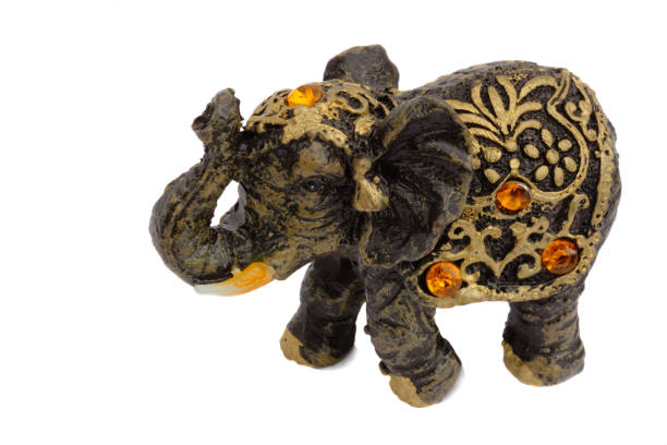 istock Figurine of a cute elephant, decorated with amber. 1290889629
