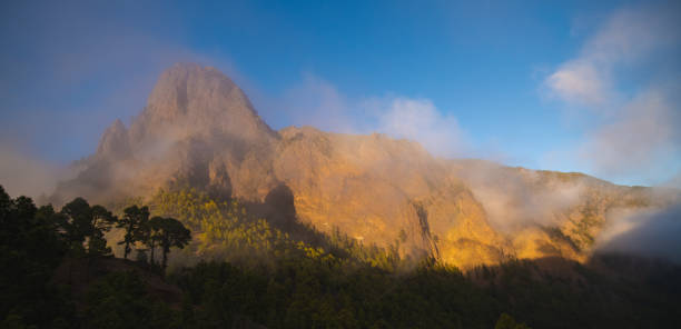 istock panoramic view of a sunlit mountain 1290894299
