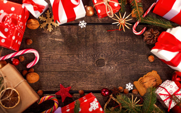 istock Handmade wrapped christmas gift boxes on celebrate background. 1290896019