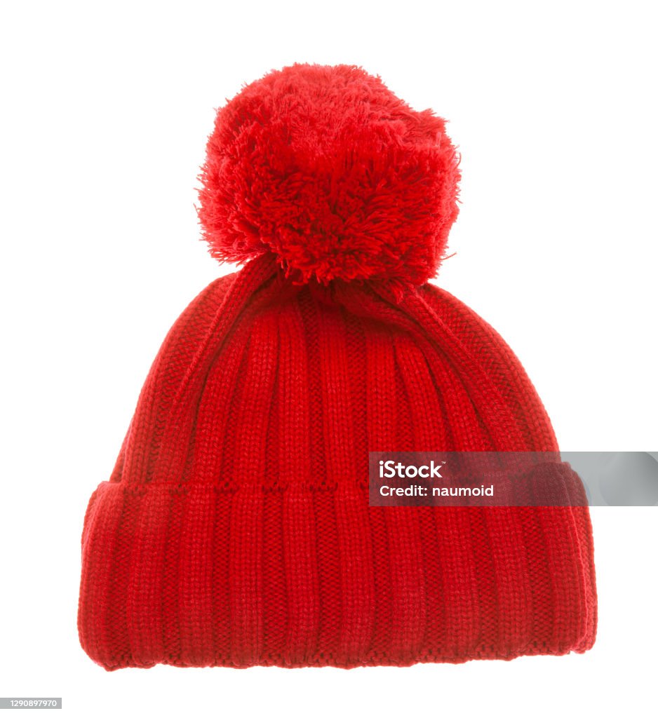 Red knit winter bobble hat isolated on white Red knitted winter bobble hat of traditional design isolated on white background. Handmade woolly cap with pompom on top Knit Hat Stock Photo