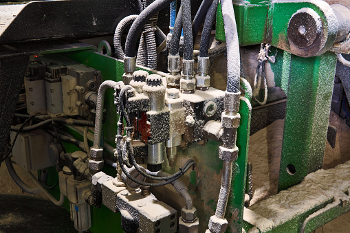 machinery and electrical equipment of the sawmill, covered with a thick layer of sawdust