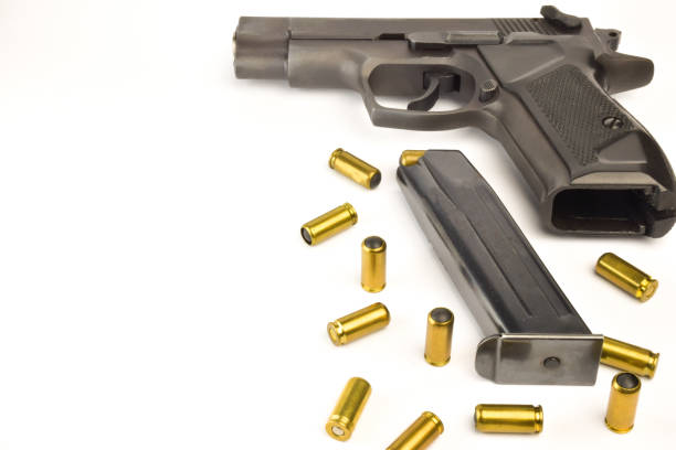 istock Pistol, magazine for it and cartridges on a white clipping background on the right side 1290901708