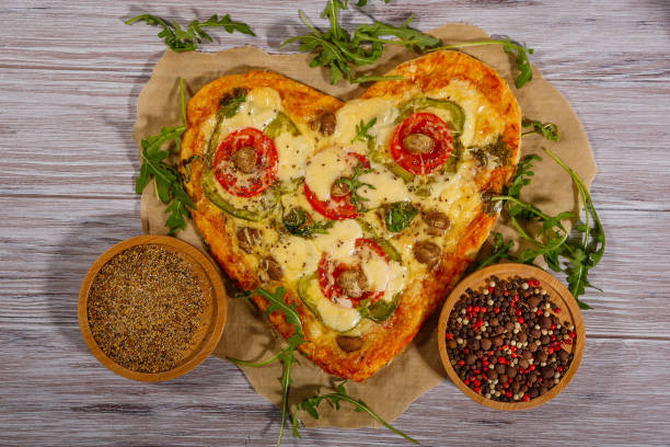 istock Pizza in the shape of a heart 1290910610