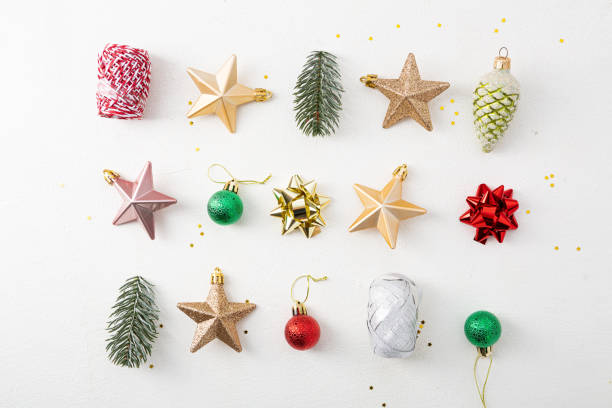istock Overhead view of Christmas decorations on white surface 1290910653